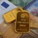 Gold bars and euro banknotes